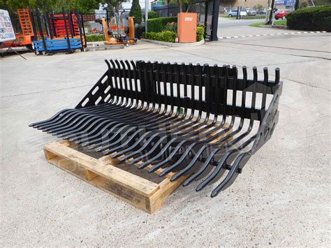 rock buckets for skid steer|skid steer rock bucket attachment.